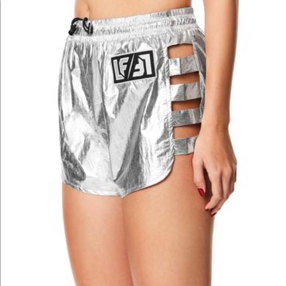 LF Pants - METALLIC SILVER LADDER CUTOUT WINDBREAKER SHORT LF Pants - METALLIC SILVER LADDER CUTOUT WINDBREAKER SHORT